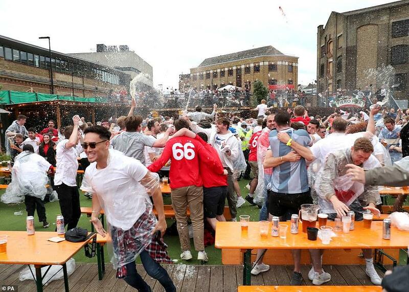 45316339-9778061-Beer_was_chucked_every_where_at_Vinegar_Yard_in_London_as_fans_c-a-239_1626034591312.jpg