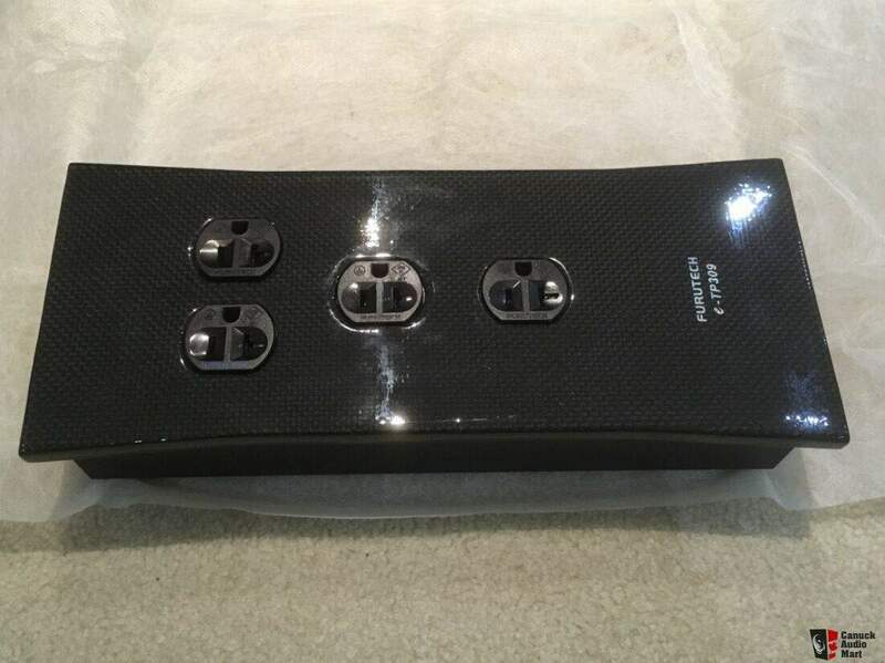 1889670-feb0d675-furutech-etp309ncf-carbon-fiber-ac-power-distributor-w-axial-locking-system-gc303.jpg