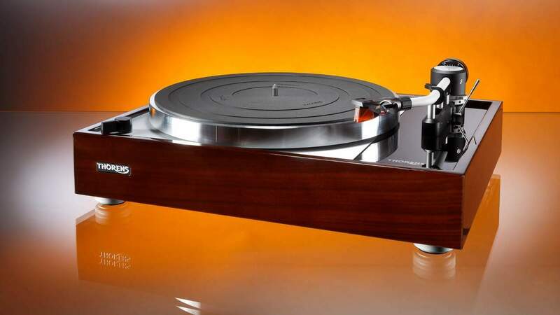 Thorens_TD1500_aufm_orange.thumb.jpg.45378ac7784871fd87a65b29eb6c144e.jpg